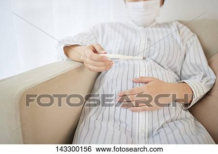 Stock Photograph - Pregnant Japanese woman. Fotosearch