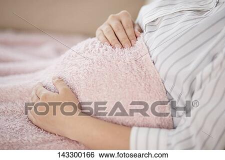 Pregnant Japanese woman View Large Photo Image Stock Photograph - Pregnant Japanese woman. Fotosearch