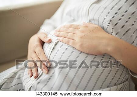 Pregnant Japanese woman View Large Photo Image Stock Photography - Pregnant Japanese woman. Fotosearch