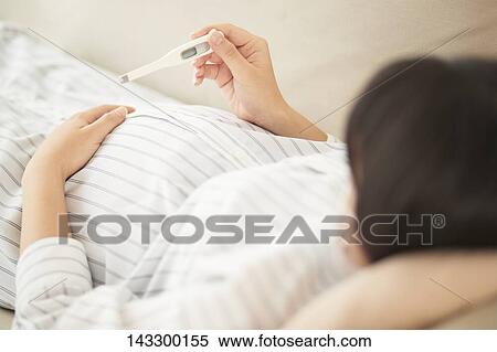 Pregnant Japanese woman View Large Photo Image Stock Photography - Pregnant Japanese woman. Fotosearch