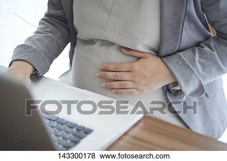 Pregnant Japanese woman working with laptop View Large Photo Image Stock Photo - Pregnant Japanese woman working with laptop. Fotosearch