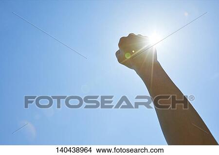 Picture - Raised Hand To The Sky. Fotosearch