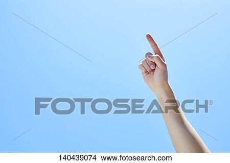 Picture - Raised Hand To The Sky. Fotosearch