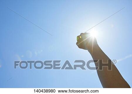 Stock Image - Raised Hand To The Sky. Fotosearch