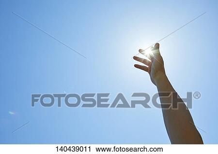 Stock Image - Raised Hand To The Sky. Fotosearch