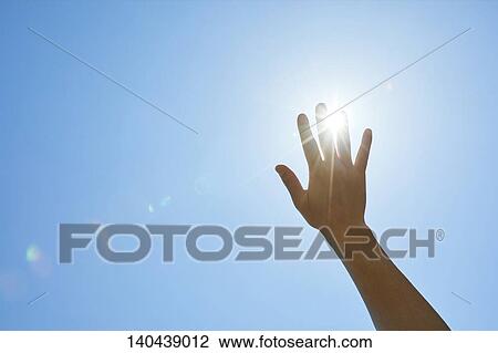 Stock Image - Raised Hand To The Sky. Fotosearch