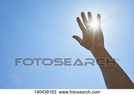 Stock Image - Raised Hand To The Sky. Fotosearch