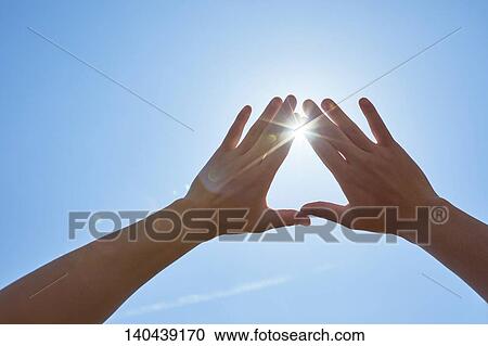 Stock Image - Raised Hand To The Sky. Fotosearch