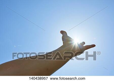 Stock Photo - Raised Hand To The Sky. Fotosearch