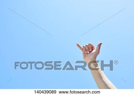 Stock Photo - Raised Hand To The Sky. Fotosearch