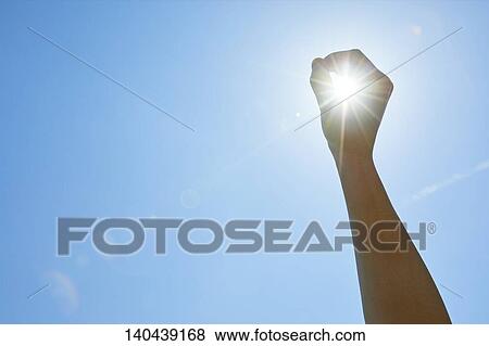 Stock Photo - Raised Hand To The Sky. Fotosearch