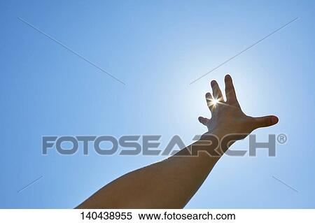 Stock Photography - Raised Hand To The Sky. Fotosearch