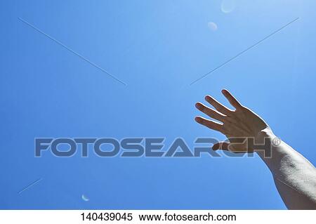 Stock Photography - Raised Hand To The Sky. Fotosearch