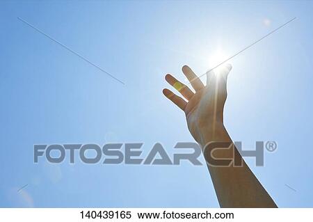 Stock Photography - Raised Hand To The Sky. Fotosearch