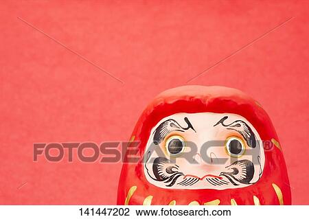 Stock Image - Red Daruma Doll. Fotosearch