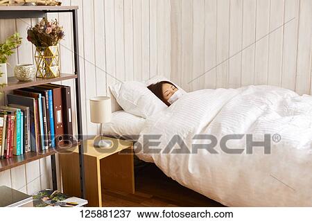 Sick Japanese woman at home View Large Photo Image Stock Photo - Sick Japanese woman at home. Fotosearch