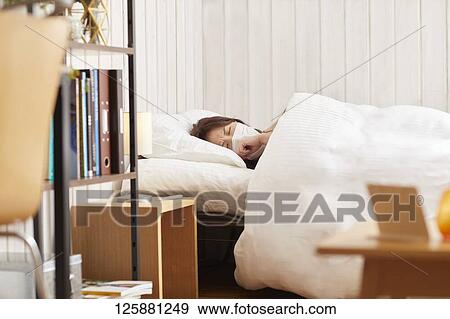 Sick Japanese woman at home View Large Photo Image Stock Photo - Sick Japanese woman at home. Fotosearch