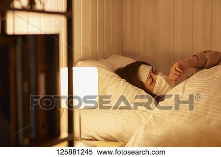 Sick Japanese woman at home View Large Photo Image Stock Photography - Sick Japanese woman at home. Fotosearch