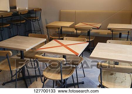 Social Distancing Measures At A Restaurant View Large Photo Image Stock Image - Social Distancing Measures At A Restaurant. Fotosearch