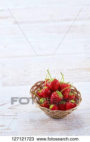 Stock Image - Strawberries In A Basket. Fotosearch