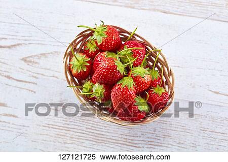 Stock Photography - Strawberries In A Basket. Fotosearch