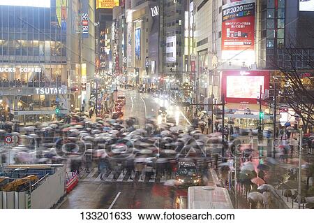 Stock Image - Streets In Tokyo At Night, Japan. Fotosearch
