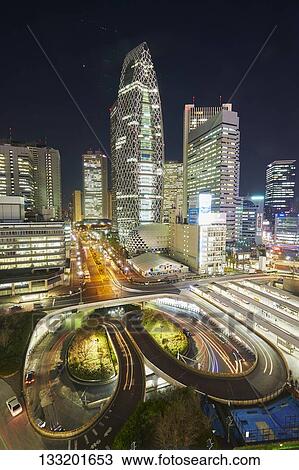 Stock Image - Streets In Tokyo At Night, Japan. Fotosearch