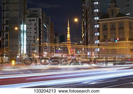 Stock Image - Streets In Tokyo At Night, Japan. Fotosearch
