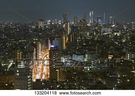 Stock Photo - Streets In Tokyo At Night, Japan. Fotosearch