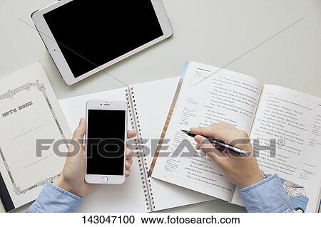 Top-down view of businesman working in the office View Large Photo Image Stock Image - Top-down view of businesman working in the office. Fotosearch