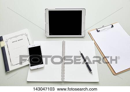 Top-down view of office equipment View Large Photo Image Stock Image - Top-down view of office equipment. Fotosearch
