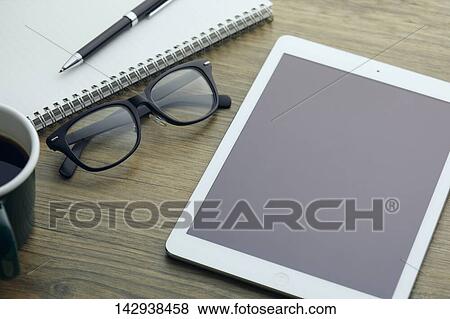 Top-down view of office equipment View Large Photo Image Stock Photo - Top-down view of office equipment. Fotosearch