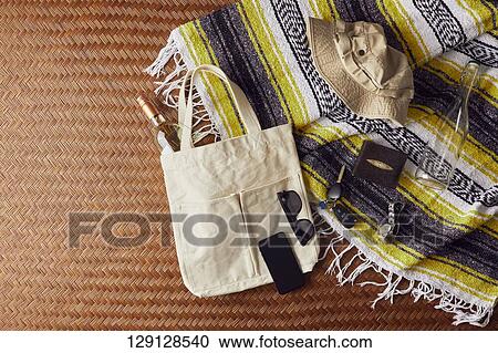 Tote Bag With Glasses, Hat, Smartphone, And Keys View Large Photo Image Stock Image - Tote Bag With Glasses, Hat, Smartphone, And Keys. Fotosearch