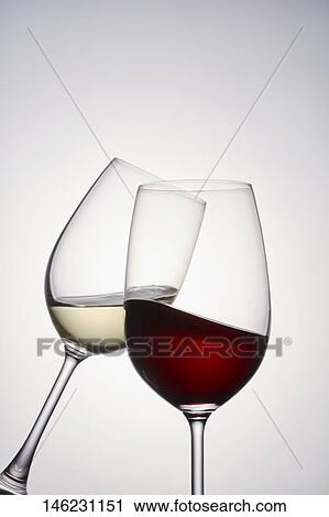 Two glasses of wine View Large Photo Image Stock Image - Two glasses of wine. Fotosearch