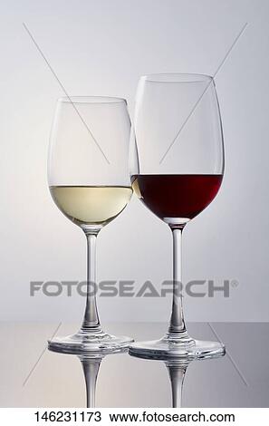 Two glasses of wine View Large Photo Image Stock Image - Two glasses of wine. Fotosearch