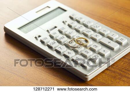 Wedding Rings On The Electronic Calculator View Large Photo Image Stock Image - Wedding Rings On The Electronic Calculator. Fotosearch