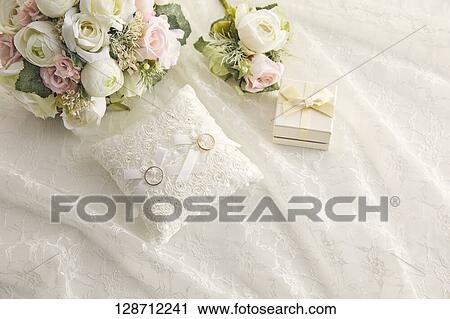 Wedding Rings With A Bouquet View Large Photo Image Stock Image - Wedding Rings With A Bouquet. Fotosearch