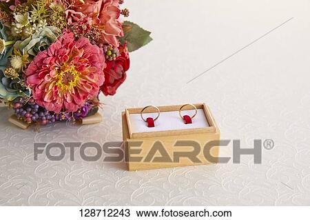 Wedding Rings With A Bouquet View Large Photo Image Stock Image - Wedding Rings With A Bouquet. Fotosearch