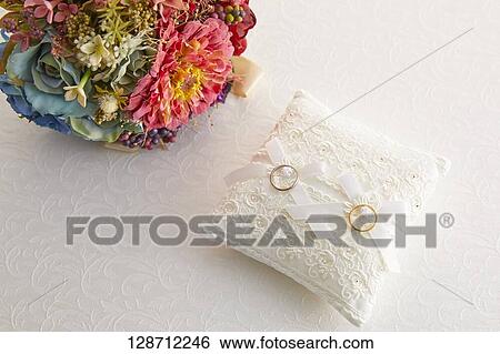 Wedding Rings With A Bouquet View Large Photo Image Stock Photograph - Wedding Rings With A Bouquet. Fotosearch