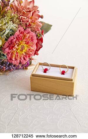 Wedding Rings With A Bouquet View Large Photo Image Stock Photography - Wedding Rings With A Bouquet. Fotosearch