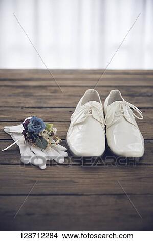 White Shoes With Globes And Flowers View Large Photo Image Picture - White Shoes With Globes And Flowers. Fotosearch