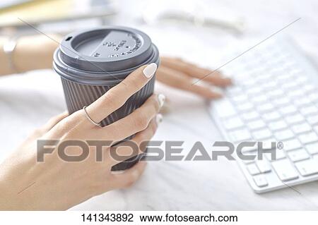 Stock Image - Woman Working With Keyboard. Fotosearch