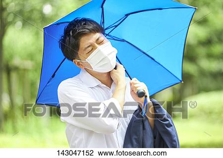 Young Japanese businessman wearing mask in the hot Summer downtown Tokyo View Large Photo Image Stock Image - Young Japanese businessman wearing mask in the hot Summer downtown Tokyo. Fotosearch