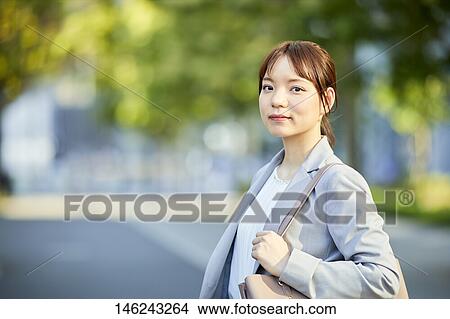 Young Japanese businesswoman outside View Large Photo Image Picture - Young Japanese businesswoman outside. Fotosearch