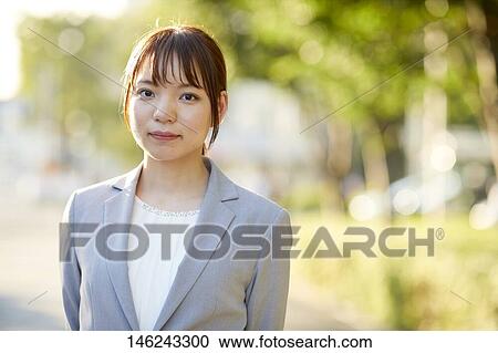 Young Japanese businesswoman outside View Large Photo Image Stock Image - Young Japanese businesswoman outside. Fotosearch