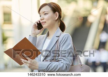 Young Japanese businesswoman outside View Large Photo Image Stock Image - Young Japanese businesswoman outside. Fotosearch