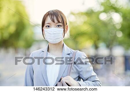Young Japanese businesswoman outside View Large Photo Image Stock Image - Young Japanese businesswoman outside. Fotosearch