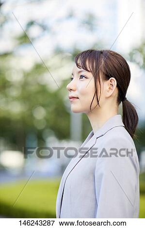 Young Japanese businesswoman outside View Large Photo Image Stock Photo - Young Japanese businesswoman outside. Fotosearch
