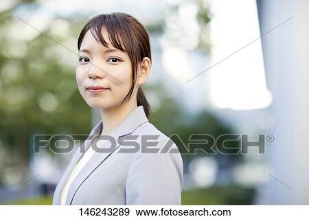 Young Japanese businesswoman outside View Large Photo Image Stock Photo - Young Japanese businesswoman outside. Fotosearch