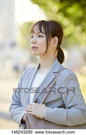 Young Japanese businesswoman outside View Large Photo Image Stock Photo - Young Japanese businesswoman outside. Fotosearch